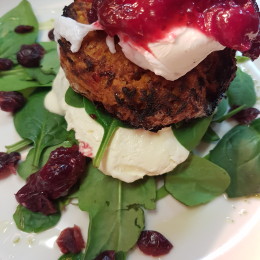 Sweet potato fritters with Poached egg, whipped fetta and cranberry sauce